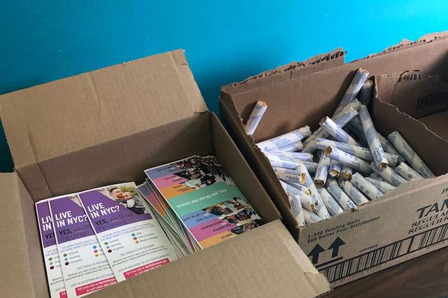 A box of tampons is pictured. The Department of Education is handing out free menstrual products to people who stop by the grab-and-go meal distribution sites.